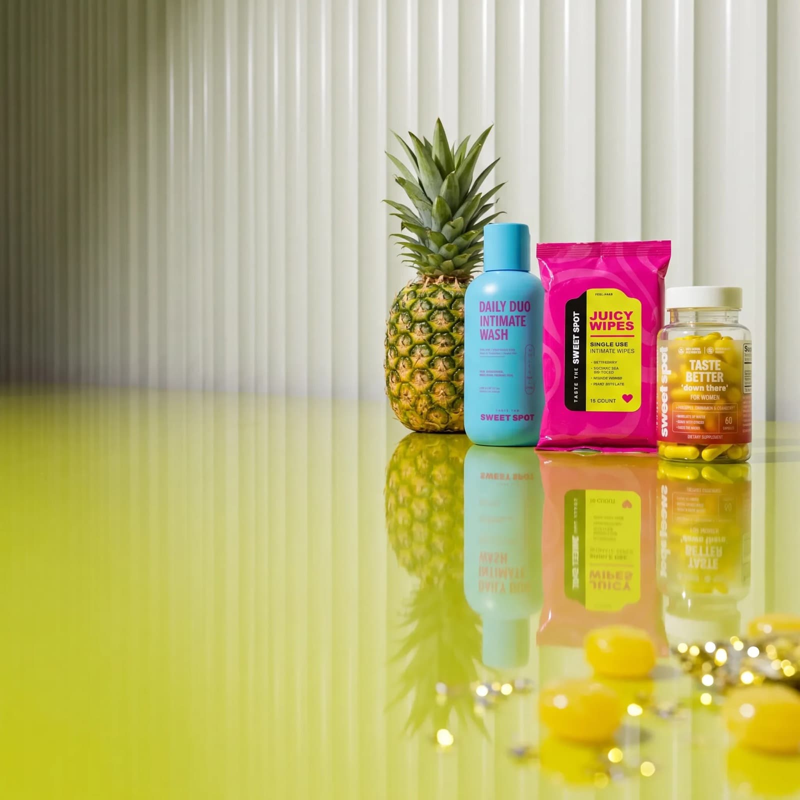 Pineapple beside wash, wipes, and the women’s capsule