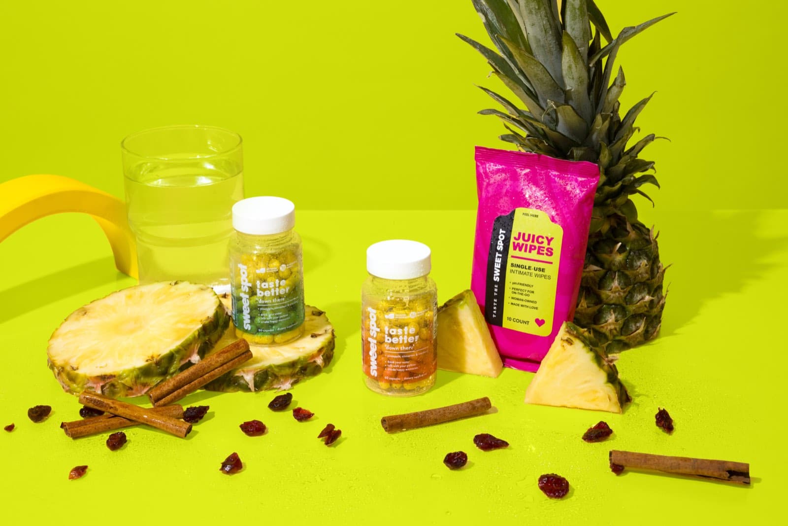 For Her, For Him, and Juicy Wipes styled with pineapple, cranberries, cinnamon, and water